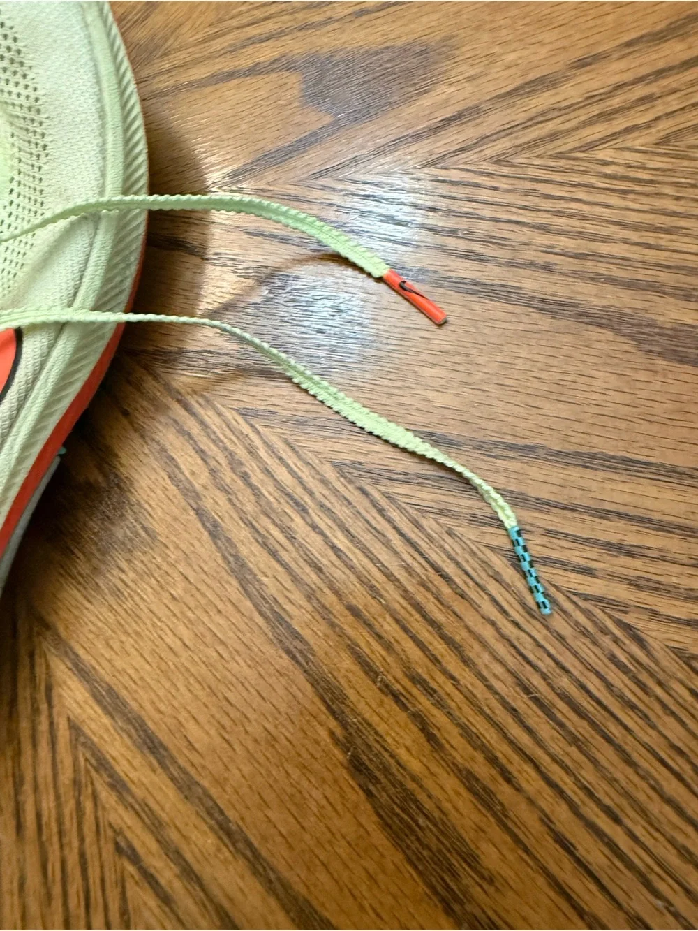 Nike Racing Shoes - Light Green with Orange Swoosh